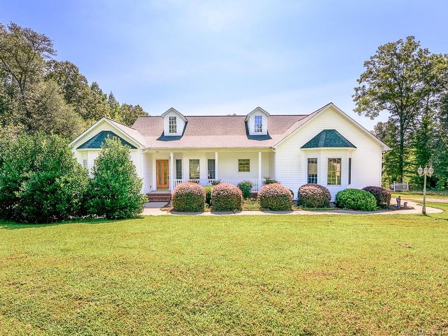 Beautiful Ranch Home on over 4 acres of land, a dream come true for those wanting to raise some animals or live off the land!  NO HOA!  Finished Basement is heated, not cooled and can be used as a Man Cave or Playroom!  Gorgeous Wood and Tile floors, updated Bathrooms, Tankless Gas Water Heater, Large sprawling Backyard completely surrounded by Mature Trees, completely private!  Separate workshop building on Property! This is a Must See to truly appreciate this home!