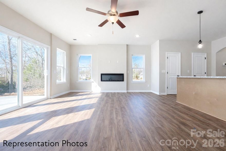 Great Incentives being offered to buyers on this end unit!  This home is MOVE IN READY. It is a beautifully designed 3 bedroom townhome with a thoughtful layout and upscale finishes included in the price. This is our popular Whitley plan AND features a large kitchen island that overlooks the main living, dining, and flexible space—perfect for entertaining and everyday living.  Homes feature timeless selections with soft grays, crisp whites, and natural wood tones throughout. Luxury vinyl plank flooring runs through the main living areas, all full bathrooms, and the laundry room for both style and durability. Upstairs, you’ll find spacious secondary bedrooms and a conveniently located laundry room, making daily routines effortless.   Each townhome includes a 16-foot privacy fence separating units, with potential HOA approval to extend fencing after purchase—allowing homeowners to create an even more private outdoor space. A perfect blend of modern design, transparency in pricing, and low-maintenance living—Abershire offers style, comfort, and value in a brand-new community. All of the homes are representation photos.