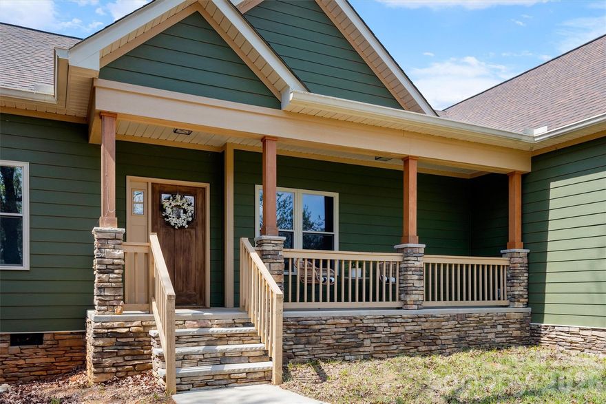 Be the first to live in this custom-built home in the award-winning Edgewater community. Privately situated on a generous, nearly three-quarter acre homesite, enjoy peaceful wooded & lake views with your morning coffee. Built by a local custom home builder, this home offers the perfect blend of quality craftsmanship and design. Ideal for those seeking space and privacy within an amenity-rich neighborhood, you’ll enjoy a setting that doesn’t feel crowded while still having access to exceptional community features. Edgewater offers resort-style amenities including a golf course, lake access, walking and biking trails, clubhouse, pool, pickleball and tennis courts. The open-concept floor plan is filled with natural light and upscale finishes throughout. The kitchen features custom cabinets, a large island, double ovens, a gas cooktop with pot filler, and lots of functional workspace. The primary suite features a spa-like bath designed for relaxation. Plus, enjoy the convenience of the community’s new restaurant, Brickwood, already receiving great reviews. There's even room for your golf cart in the garage. For those seeking a custom home with a true sense of space and privacy rarely found in amenity-filled neighborhoods - this is one is a standout!