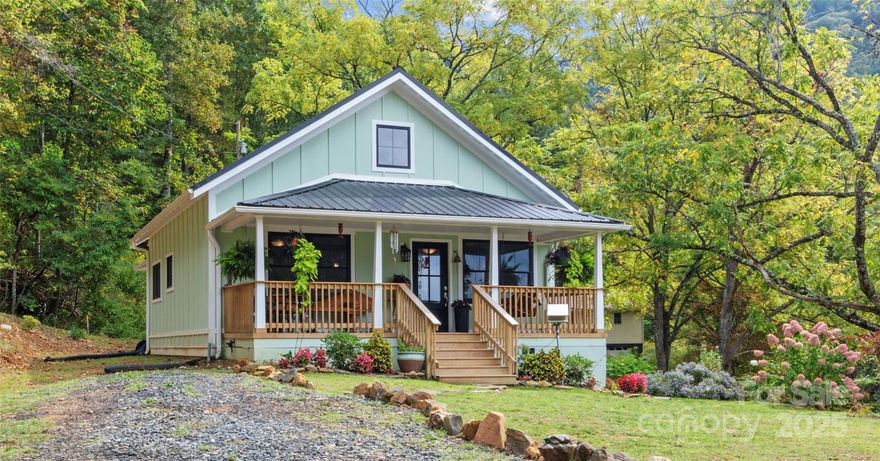 Beautifully restored and complete renovation!  This home has been updated inside and out, with gorgeous new kitchen and baths.  2 Bedroom and 2 full baths, new HVAC with gas backup.  Beautiful 16+ acres located in Bakersville at 3000+ elevation.   Huge barn sits in gently sloping field, and the balance of the acreage is wooded including several small creeks and springs. Beautiful building spots.  Only one neighbor passed this house on Terrell Dr, very private and borders land protected by the Appalachian Conservancy. This home had no damage from Hurricane Helene.  This is the perfect mini farm or private get away! Come and see this home today.