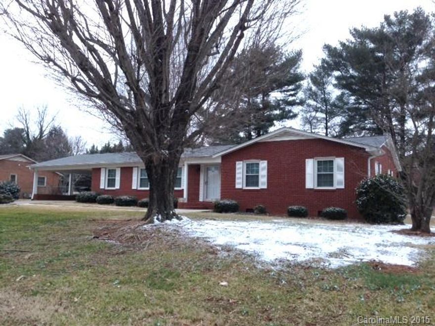 READY FOR OCCUPANCY! Well maintained traditional brick ranch in convenient location.!Nice sized yard that backs up TO YMCA-never had any problems with noise or issues with playing basketball or other outside sports.Formal living room and separate formal dining room. Greatroom on back side of home features spacious den(has fireplace), eat-in bar & kitchen w/good cabinet space and countertop space.Master bath has handicapped accessible shower. Included: Kitchen Refrigerator,Washer,Electric Dryer.