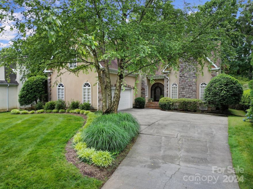 Welcome to this custom built home that is tucked away on a quiet cul-de-sac just minutes from Southpark and .5 mile from Quail Hollow Country Club! This one of a kind home welcomes you from the moment you step through the unique front door into the Two story grand living room that is the heart of this home w/gas fireplace and adjoining dining room. The kitchen is large, warm, and inviting. Large primary suite on main level w/dual closets and an en suite featuring a jacuzzi tub. Head upstairs and find three additional bedrooms, 2 full baths, and Large bonus room/office with french doors and fireplace. Take in all the beautiful landscape from your deck overlooking private yard with tranquil koi pond. Home boasts tons of natural light with all the skylights accenting the vaulted ceilings and extensive millwork and craftsmanship throughout and a stones throw away from shopping, restaurants, and more! A true one of a kind home that reminds you what a special part of Charlotte this area is.