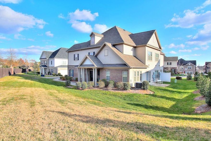 Rare dual master in the quiet and upscale community of Riviera in west Ballantyne! Spacious and meticulously maintained end unit has an open floor plan with a master down, and a 2nd master/guest suite with sitting area on the second floor plus a loft/office. All of the designer upgrades you are looking for, in an almost brand new home. Upgraded kitchen backsplash and granite countertops, cultured marble with dual sinks in both master baths, optional extended shower in main floor master bath, hardwood floors, brand new carpet (12/7/17), custom paint colors, and upgraded fixtures. 42" maple cabinets in kitchen, large walk-in pantry, stainless steel appliances including gas range, and much more. Within walking distance to the pool, restaurants, gym, Ballantyne Elementary, and more. Great school system! Location-location-location!!