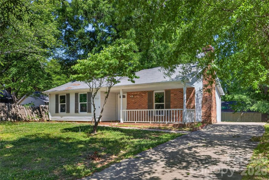 Welcome to 5911 Morninglow Ct, a charming 2 bed, 2 bath ranch on a quiet cul-de-sac in East Charlotte. Step inside to brand-new LVP flooring flowing through an open living and dining space, anchored by a cozy fireplace. Enjoy all new windows throughout the home, plus the kitchen and both bathrooms have been thoughtfully updated. Out back, a freshly rebuilt deck overlooks a private yard with room to garden, grill, or just unwind. Single-story living, no HOA, and a quick commute to Uptown, NoDa, and Matthews. Whether you're a first-time buyer, downsizer, or investor, this one checks the boxes.