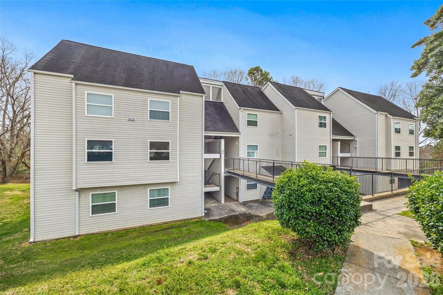 Great investment opportunity in North Charlotte! This 1 bed, 1 bath condo offers low-maintenance living with strong rental potential. Currently marketed for rent at $995/month with new management in place, making it a turnkey option for investors. Features include LVP flooring throughout (tile in bath), a spacious living area open to the dining and kitchen, and a private patio with peaceful wooded views. The kitchen is equipped with range/oven and dishwasher, and the bedroom offers a large closet. Tiled tub/shower and tile flooring in the bathroom. Laundry connections conveniently located in unit. Prime location with easy access to I-485 and just minutes to the airport, dining, and shopping.