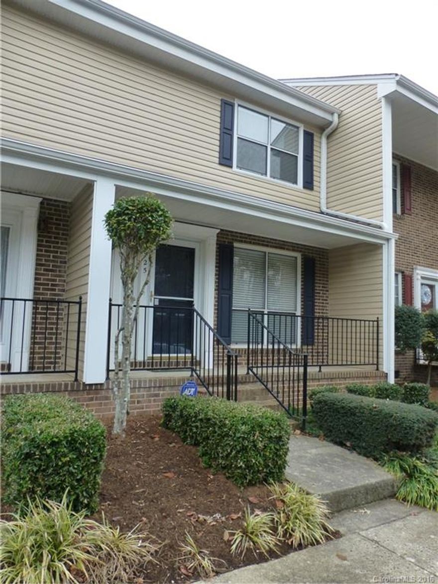 Sunny unit has bamboo laminate flooring. Cul-d-sac location with front porch and open space in back.