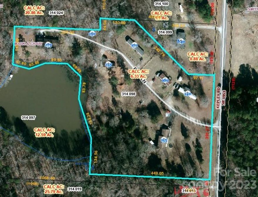 Mobil Home park including two framed houses, two double wide's one single wide and one lot rent. $4950.00 in current oncome with room to increase. Call listing agent for information. DO NOT disturbed tenants.