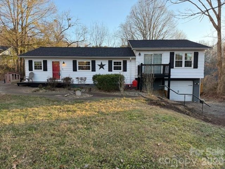 A great home in a great location. Located just a few miles from the restaurants and shops of Main Street Rutherfordton, this property has the feeling of being out in the country but is close to town. As you walk into the home you notice the open kitchen, dining area and living room. From the living room there is a door going to the wooden deck on the back of the house. Part of the deck is covered making it great area to spend early mornings with a cup of coffee or late evenings watching the sun go down. Also on this level there is a full bathroom, bedroom and bonus room with laundry area. On the upper level there is the spacious Primary bedroom and bathroom with a door leading to a small deck area. There is also another bedroom on the level. The home has lots of updates. Outside there is a spacious fenced in backyard, great for kids and pets.  There is a fire pit area for those cool fall evenings sitting by the fire.The crawlspace is big enough to walk in and has some storage there as well. The garage area also provides substantial storage and could be used as a shop area or Man Cave/She Shed. This home has it all. Great location, very functional layout and awesome outdoor areas. Schedule your showing today.