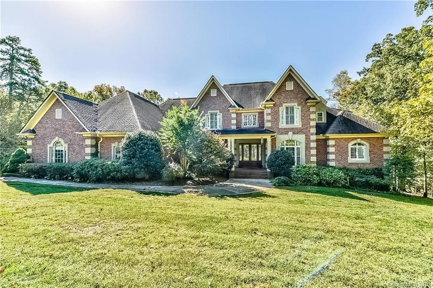 Catawba River- front Estate on almost 5 ac in Beckenham. 7 BR custom beauty. MB w/fpl & lux bath/designer closet on main. Guest suite on main. Formals. Sunrm.  Lrg kit opens to GR. Laundry down. custom mud rm. 4 generous sized BR's up. Fin b'ment w/bdrm, bath, rec & play room. Sec living/in law suite.  Basement garage for boat or RV. Workshop. Large storage rooms. Exercise room. Fabulous pool. Covered porch. Wooded trail to river for fishing/kayaking. 5 car garage.  Truly one of a kind retreat!