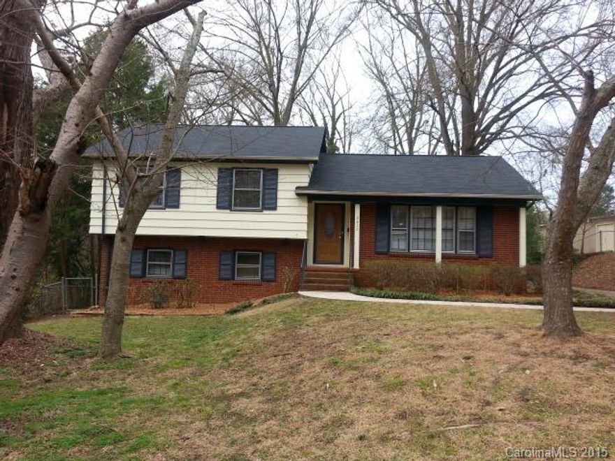 Located at the end of the street off of South Blvd. Walk into this home and see beautiful hardwood floors in the living and dining room. Kitchen is fully equipped with a built in table and plenty of storage. New carpet throughout and freshly painted. The upper level has 3 very nicely sized bedrooms and a full bath. The lower level as a great room and another bedroom with its own full bath. Back door to back yard could be a separate entrance to the lower level. Call to see this today!