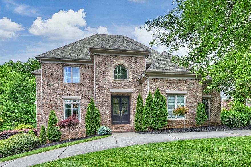 This is the one you've been waiting for! Beautifully appointed, lovingly maintained custom-built brick two story with finished basement on a .81 acre tranquil, private, wooded lot in a location convenient to the major private schools, parks, SouthPark shopping, restaurants, and breweries. 10' ceilings! True Chef's gourmet exotic granite island Kitchen with multiple sinks, custom walk-in Pantry, Appliance Pantry, Butlers Pantry, Coffee Bar, storage galore and much more will delight the cook/baker in your family. Sunroom with multiple picture windows overlooking your private, landscaped back yard. Roomy Primary Bedroom with cove-lit tray ceiling, his/her closets, and lavish bath with steam shower. Basement Game Room / Media Room, Exercise / Workout Room, Home Office / Bedroom #5 with full Bath, and voluminous walk-in storage (could be finished for future heated living area!). More! Move in now!