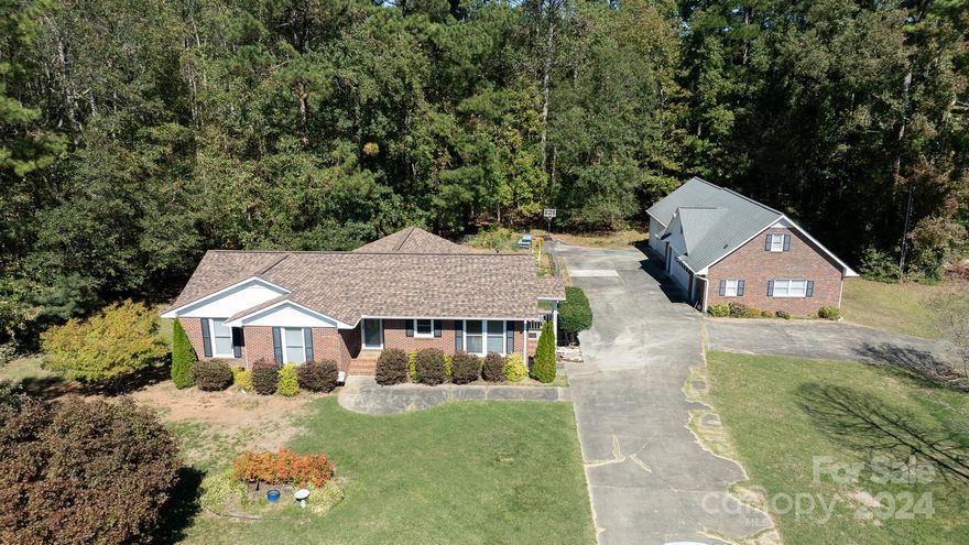 This well-maintained all-brick home offers 3 bedrooms, 2 bathrooms, and is situated on 1.11 acres. Key features include a 4-car detached brick garage with an office and half bath, as well as a walk-up attic that could be finished into a bonus room or apartment.

Recent updates include a new roof (2020), a complete kitchen remodel (2015), and a brand-new HVAC unit (Sept. 2024). The kitchen comes with stainless steel appliances: microwave, refrigerator, stove, and dishwasher.

The property also has a fenced backyard, providing ample outdoor space.