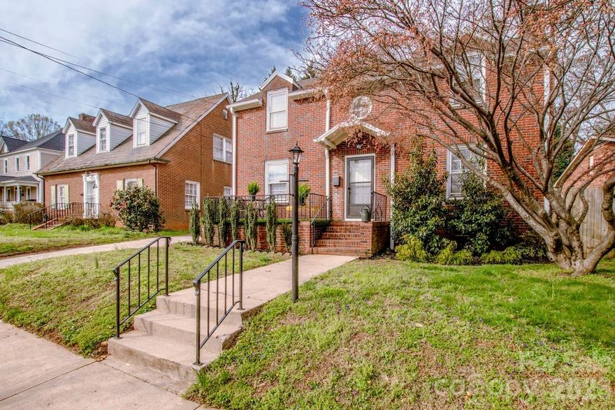 Historic Brick Home in Statesville featuring 4 bedrooms, 2 bathrooms and No HOA. Located in the City of Statesville’s Local Historic District, this 1940 multicolored brick home offers 2,121 sq ft of heated living space. The main level features a family room with a wood-burning fireplace and a formal dining room with original built-ins. French doors connect the spaces. A fourth bedroom on the main level works well as a primary suite, guest room, or office. The kitchen has tile flooring and black appliances. Mudroom and laundry area with utility sink. City water & sewer, a basement and annual taxes of 1,340. Convenient access to Hwy 70, Hwy 21, I-40, and I-77. Showings are available daily.