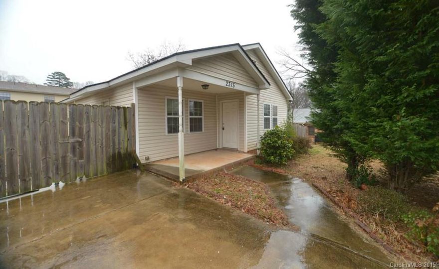 4 bedroom, 2 bathroom home with huge fenced backyard! Range and refrigerator are included. Eat-in kitchen and neutral colors throughout.