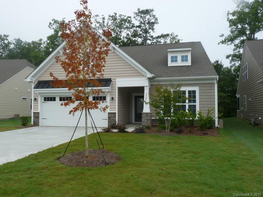 Beautiful Like new home with Granite, SS Appliances and lots of hardwoods. Great Master with sitting area exiting to screened porch. Great Master Bath with garden tub and separate shower. Large Great  Room is open to kitchen and exits to screened porch. Home backs up to wooded area for privacy.