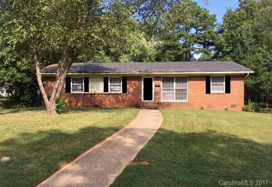 Beautifully remodeled 3 or 4 BR (or bonus) ranch-style home in the booming Windsor Park Subdivision. New white kitchen cabinets, black appliances including refrigerator & icemaker, electric range, range hood and dishwasher. New Frieze carpeting and vinyl flooring throughout. New lighting. New six panel doors. Freshly painted throughout. Newer central AC & gas heat. Large concrete driveway for multi-car parking. Rear yard storage building.Convenient to restaurants, hospitals and Uptown Charlotte.