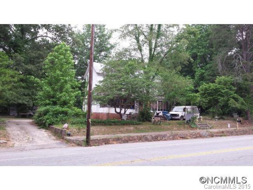 2.9 Acres, could be subdivided ~ Recorded as 5 lots ~ ALL INFO taken from Tax Records. Agent has NOT seen the house. SOLD AS-IS. Runs street (HWY 176) to street (Lude Johnson). Backs up to SC DOT on one side and SC District 1 on the other - the State of SC / County of Spartanburg should buy this!! Hey, Spec Builders Developers or small business owners, this would make a great investment!  Call Agent with Questions