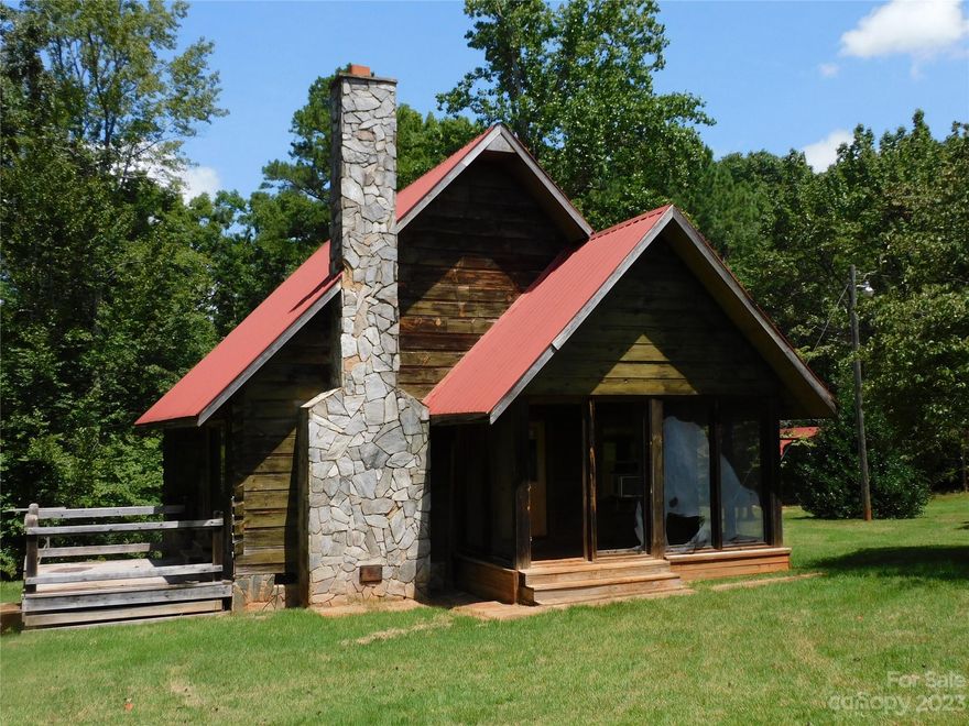 Wonderful log cabin  on 5 acres  near York and shopping. 2 bedrooms, 1 full bath and giant loft or 3rd bedroom  Brick fireplace in living area, covered porches and deck.  carports and chicken coops.   Woods and small stream on property. Contractor will clear CL100 from Auten Pest Control.