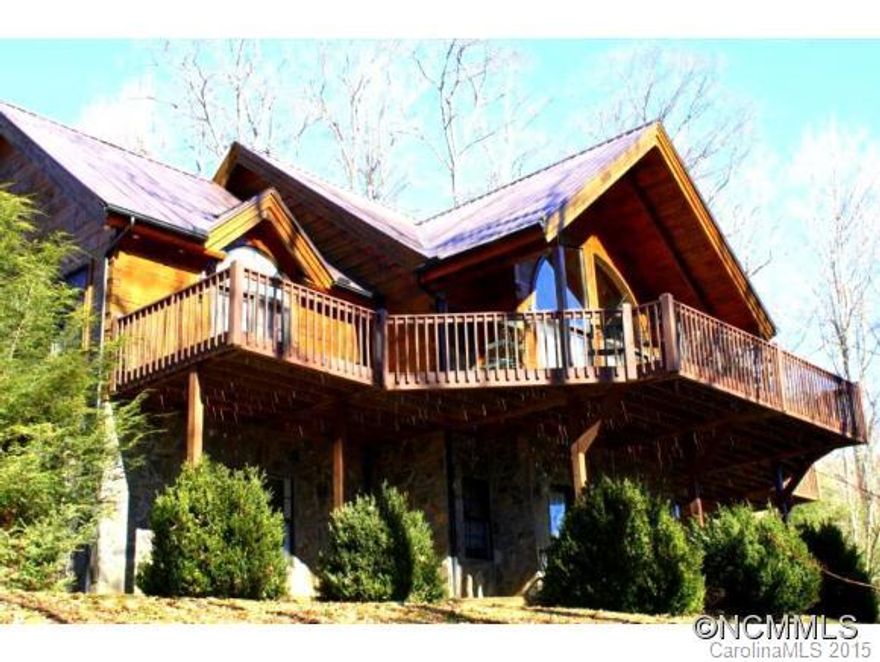 Sturdy & Spacious Log Home, 2.5 Stories Main/Loft & Bsemnt, Open Fl Plan, 20 FT Vaulted T&G Ceilings & Window Wall, 4 French Doors, Gas Logs, Ceramic Tiled Kitchen w/ Island, GE Profile Apps, Basement w/ 2 BR/1BA, DBL Garage & Work Shop area. 2 Covered Decks, 6 YO Metal Roof, Handicapped Ramp, Trane Propane Heat, All paved Roads & Drive, Over 4,000 FT elev, Great Location Betw Country Club & Village, Covered Deck, Faces SW, Good Sun All Day.