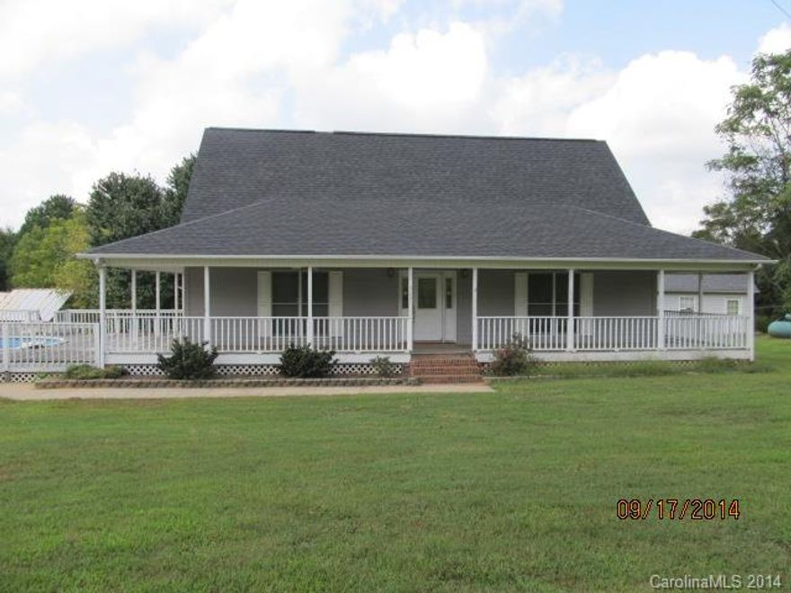 York County Country Living. Cape Cod Home on 1 Acre Lot Outside of Clover,SC  Large Wrap Around Porch.  2 Car Detached Garage Plus Storage Building. Above Ground Pool w/Decking. Home also Has a Detached Recreation Bldg. Interior has 3 Bedrooms w/Master on Main, 2 Baths, Vaulted Great Room w/Fireplace...Nice Open Floorplan.