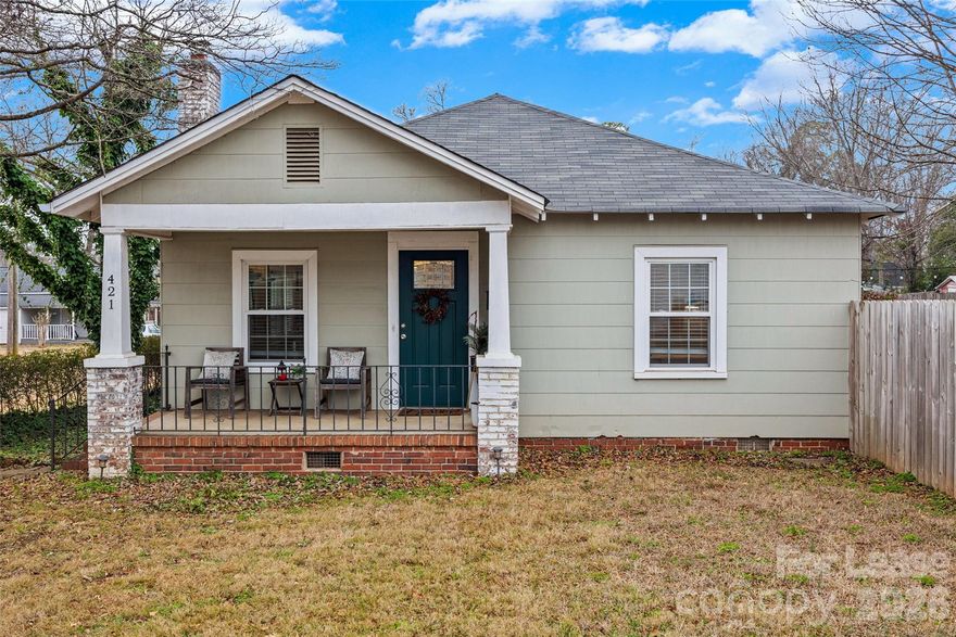 Charming and well-maintained 2 bedroom, 1 bathroom home just minutes from downtown Rock Hill! This thoughtfully designed home features an open-concept living area that seamlessly connects the living room, dining space, and kitchen—perfect for everyday living and entertaining.

Built in 1931 and meticulously cared for, this home blends classic character with comfortable functionality. The second bedroom features an amazing Murphy bed, making it the perfect flexible space to maximize square footage—ideal for a guest room, home office, or multi-purpose room.

Enjoy outdoor living with a fenced yard and patio, great for relaxing or hosting guests. A convenient carport includes a large storage shed, offering plenty of space for tools, bikes, or seasonal items.

Located close to shopping, dining, and all the conveniences of downtown Rock Hill, this home offers charm, versatility, and an unbeatable location. A rare find—schedule your showing today!