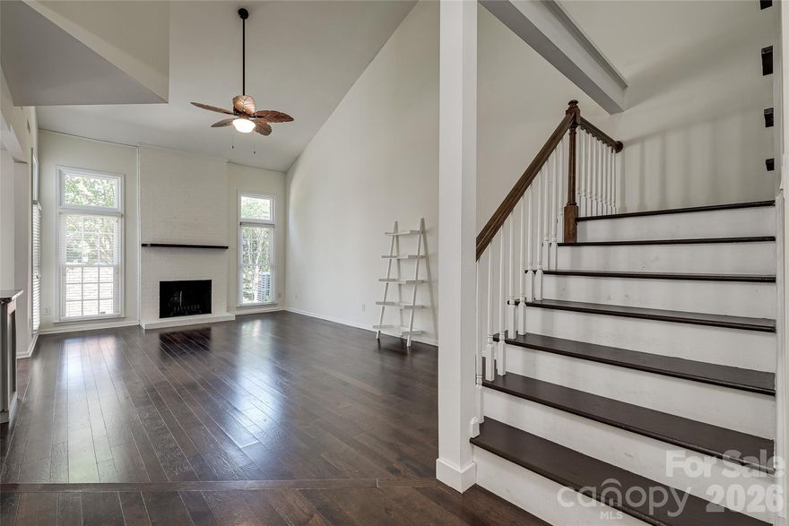 Welcome to Park Walk in the heart of South Charlotte. This updated 2-bedroom, 2-bath condo offers an open and airy floorplan with vaulted ceilings, abundant natural light, and stylish finishes throughout. The spacious great room features hardwood floors and a cozy brick wood-burning fireplace, flowing seamlessly into the updated kitchen complete with granite countertops, large island, and included appliances.

The main level bedroom includes direct access to a full bath, while the upper-level primary suite offers a private retreat with a sitting area, built-in desk, and full bath. A versatile loft space is perfect for a home office, reading nook, or flex area.

Enjoy relaxing evenings on the private enclosed brick patio overlooking green space. Community amenities include a pool and tennis courts, all within a prime location between SouthPark and Ballantyne with convenient access to shopping, dining, parks, and major commuter routes.

Move-in ready and full of charm, this South Charlotte condo offers low-maintenance living in a highly desirable location.