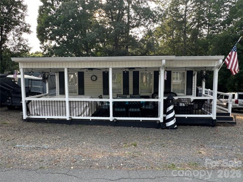 Photo of 138 Marina Drive, New London, NC 28127 (MLS # 4398855)