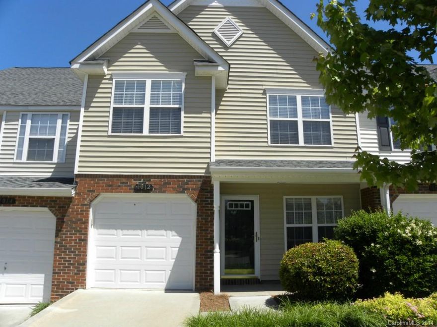 This is no ordinary townhome. Former model home that has rarely been lived in. All the upgrades in this unit. Custom mirrors, moldings, chair railings just to name a few. Perfect for entertaining with open floor plan and separate living and 2-story great room. Private back patio.