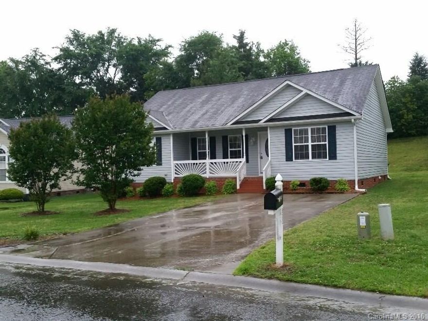 MOVE IN READY!!!! Adorable 3 BR 2Bath home boasts new flooring throughout, freshly painted, upgraded new ceiling fans/light fixtures and new countertops in kitchen.  Open floorplan with vaulted ceiling, spacious master suite and rocking chair front porch and back deck perfect for entertaining!!! Great neighborhood with low Cabarrus County taxes and excellent schools!!! Owner is a NC Realtor