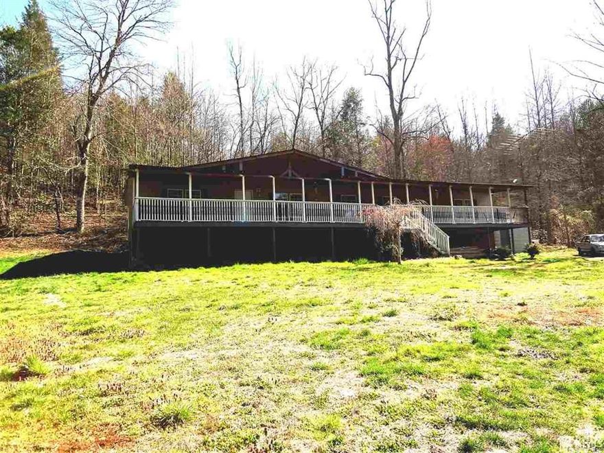 This 76'x28' Fleetwood double wide and 8.2 acres needs TLC but comes with great land for farming. Most of the land is cleared. Two sections  are currently planted with blue berry bushes and have potential value. Property is bordered by streams. The house is equipped with a heat pump but the owner heats the entire house with a large Hot Blast wood furnace which is connected to the duct work. One BR  now serves as a large laundry room. The dwelling came with a 4th BR but the septic approval is only for 3BRs. This 4th BR has been an all purpose room. Property is priced below tax value. Recently reduced $10,000!