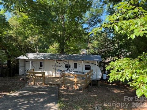 Photo of 131 Twin Bluff Trail, Mount Gilead, NC 27306 (MLS # 4382444)