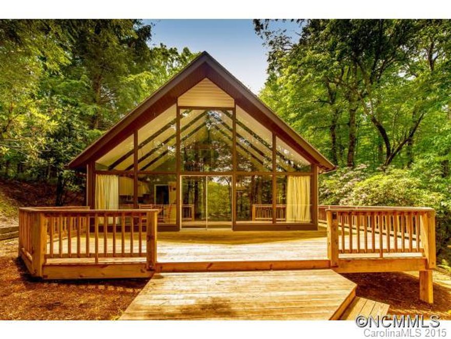 Perfect vacation A-frame on Lake Tiaroga. Wall of glass to enjoy views yr round. GR features lrg rock fp w/gas logs, built-in shelves & vaulted ceiling. Ceiling fans throughout. Almost new refrig, disposal, W/D. Mitsubishi heating/cooling systems up & down. Outside features circular drive  & steps to lake w/floating dock & red canoe (included).Detached shed w/cabinets,workbench & electrical. CFPOA UAFee of $8000