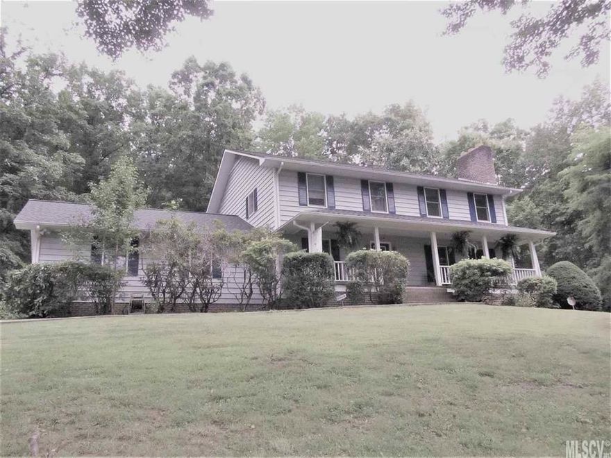 Spacious 4BR/4BA home in mountain like setting.  Home has a large front porch that enters into foyer of home and off to the right is the formal living room with gas logs and opens to screened in porch.  Kitchen offers a breakfast nook overlooking backyard and large back deck.  There is plenty of cabinet space and a bar area to eat at.  There is a guest bedroom and/or office on the main level.  On the 2nd floor there is the large master bedroom and bathroom along with two other bedrooms and another full bath.  The basement is finished and has a large family room area and a room that would be used for working out or an office or a media room.  Basement also has a full bathroom.  Back deck is large and perfect for entertaining.  Very private.