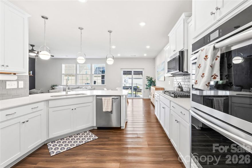 Better Than New & Designed for Every Generation! Skip the 10-month build wait and move into this stunning 2023 Lennar "Grisham" model today. Located on a quiet cul-de-sac in the premier Chateau community, this 5-BR, 4.5-BA home is a masterclass in functional luxury.

The standout feature? A rare, private main-level guest suite with a full bath—ideal for multi-generational living, long-term guests, or a secluded executive office. The open-concept heart of the home features a chef’s kitchen with gas cooktop, double ovens, and a massive island perfect for large family gatherings.

Upstairs, the oversized primary retreat and a versatile loft offer space for everyone to spread out. Enjoy custom upgrades throughout, including built-in office shelving, custom closets, and an extended patio with a gazebo for outdoor entertaining. Resort-style amenities and top-tier Steele Creek location make this the perfect "forever home" for your entire family.

Chateau Amenities: Resort-style pool, clubhouse, fitness center, tennis courts, and playground. 1 
Location: Unbeatable proximity to River Gate shopping, McDowell Nature Preserve, Lake Wylie, and easy access to I-485/CLT Airport. 2  Exceptional value in a district where new builds are soaring