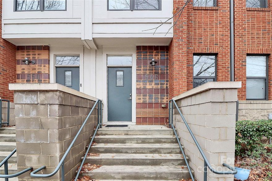 Charming 2 bed/2 bath condo located just minutes from Uptown Charlotte!  Discover the perfect blend of comfort and convenience in this beautifully and thoughtfully designed condo located just outside the vibrant city of Charlotte.  Step inside to find stunning wood floors throughout, creating a warm and inviting ambiance. The entry level welcomes you with a spacious living area, a cozy bedroom, and a full bathroom, perfect for guests or as a private retreat. Upstairs, you’ll find an open-concept kitchen, dining area, and additional living space—ideal for entertaining or relaxing after a long day. The upper level also features the second generously sized bedroom and another full bathroom, ensuring privacy and comfort.  Conveniently located right by I277, this home offers the ideal balance of suburban tranquility and urban excitement, with Uptown Charlotte’s restaurants, bars, and sightseeing destinations only a short distance away. Don’t miss out—schedule your showing today!