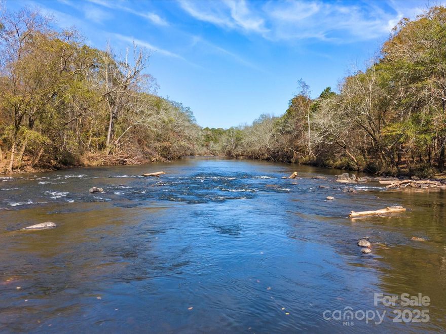 Great property to park a 1031, this property is perfect for a World Class Equestrian Center, Hunting Preserve and/or Wedding/Social Venue.  These preserves/venues are generating huge revenues.  The first time you step foot on 5690 Rocky Mount Church Rd, you’ll feel the history in the air. 
   As you walk through the rolling hills, past the pond reflecting the bright Carolina sky, and down to the riverbank with over 2,700 feet of Rocky River frontage, you’ll realize—this land has more than potential, It has heart. Whether you’re imagining a family homestead, a horse farm, or a personal retreat, it’s here waiting for you. Wildlife roam freely-deer, turkey, duck/impoundment and dove field—bringing the landscape to life.
     And though it feels like a world away, you’re just an hour from Charlotte, close enough for modern comforts yet far enough to truly escape. This land is more than an investment—it’s a dream waiting to be fulfilled. Come see it and start your story here.