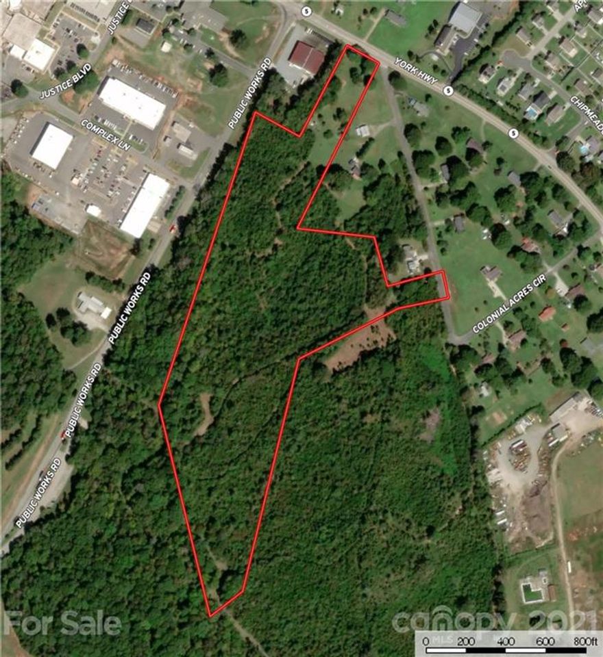 Approximately 21.7+/- acres of undeveloped land that would be ideal for investment or to build a private home on.  Land has access to county water and county sewer but new buyer would have to confirm ability to connect to these systems.  Property will be sub-divided out of larger tract of land and new survey will be required to close.