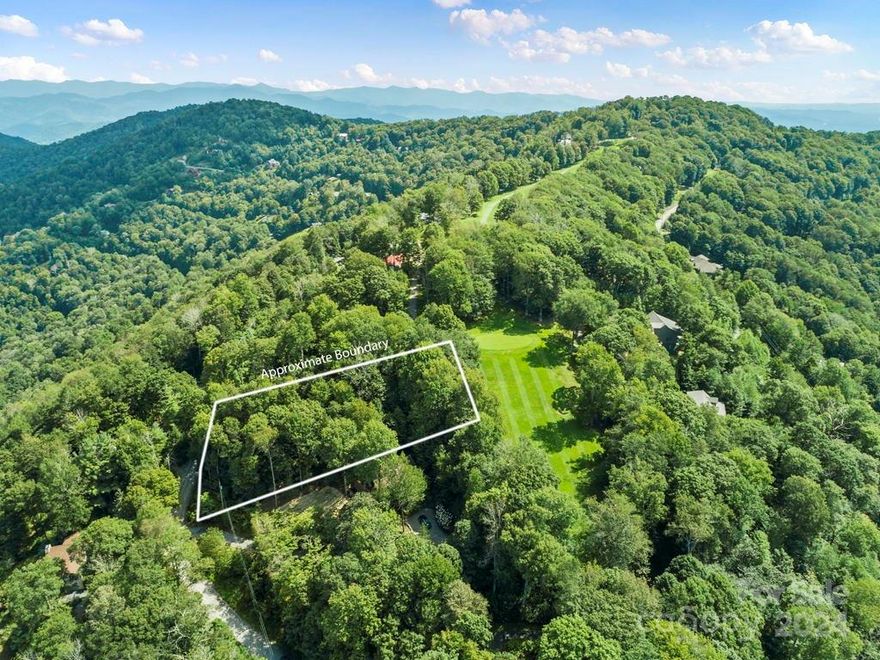 Incredible view potential from this high elevation lot nestled in woods of the Blue Ridge Mountains @ 4,680ft.
4 Bedroom Expired Perk Test Attached. 936 Upper Lookout is located on Hole #2, (a par 3) of the 18 hole championship golf course which is both challenging & stunningly beautiful. Wolf Laurel Community has so much to offer for all ages. With 5,300 acres surrounded by protected land on 3 sides, Wolf Laurel is a nature lovers paradise w/so much to do for all ages. You can hike, bike, or ski on the miles of internal trail systems Wolf Laurel offers or hop on the Appalachian Trail from numerous points inside Wolf Laurel. With the Optional Village Club & Wolf Laurel Country Club you can enjoy swimming, tennis, pickle ball, sports courts, fishing & golf, with activities planned throughout the season. All within 33 miles of Asheville. Come see why people call us the Hidden Gem of the Blue Ridge Mountains.