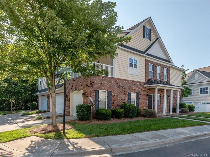 Location, location, location! Move in ready, 2 Bed, 2 Bath Ballantyne Condo. New paint and refinished hardwoods. Enjoy time relaxing on the tiled covered porch/balcony. Hardwoods in main living area. Vaulted Ceilings and Gas Fireplace in Great Room. Open kitchen with 42" cabinets, island, granite counter tops and mosaic tile backsplash. SS Appliances. Ceiling Fans in Great Room and Bedrooms. Tray Ceilings in Master Bedroom with Dual Vanity in Master Bath. End unit with attached 1 car garage.