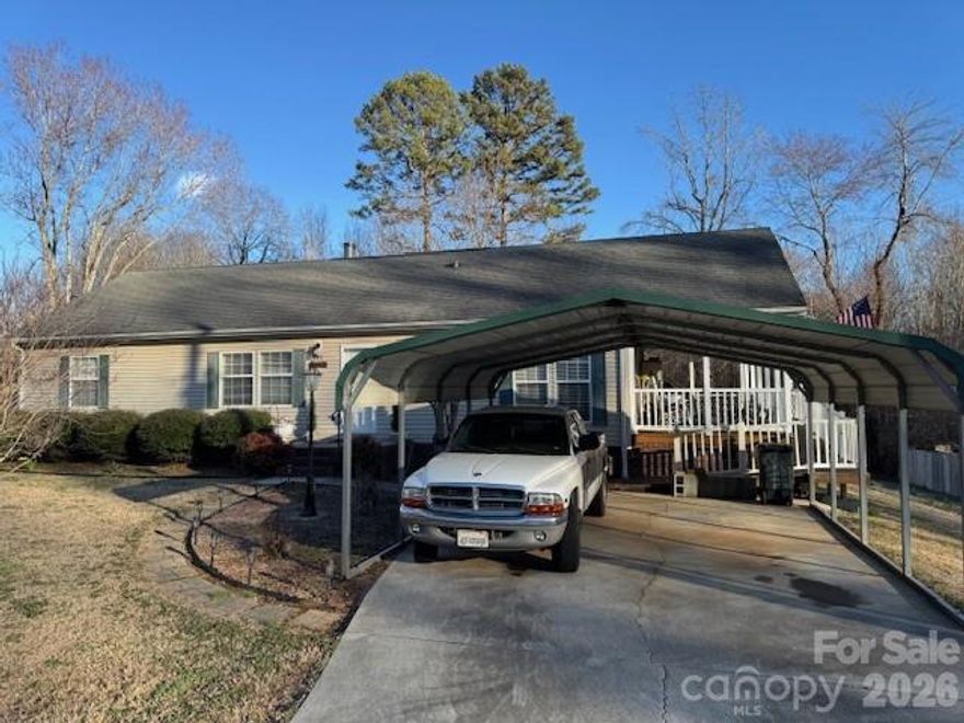 Welcome home to peaceful country living just minutes from town! This well-maintained 1,404 sq ft manufactured home sits on a spacious 0.4-acre lot in desirable Statesville, NC, offering the perfect blend of privacy and convenience.

Step inside to find a bright and inviting floor plan with generous living spaces, ideal for both relaxing and entertaining. The home features a comfortable living area, a well-appointed kitchen with ample cabinet space, and a dining area perfect for family meals. The split-bedroom layout provides added privacy, with a spacious primary suite that includes a private bath and plenty of closet space.

Outside, enjoy the open yard with room for gardening, pets, or outdoor gatherings. With nearly half an acre, there’s space to create your own backyard retreat — whether that’s a fire pit, play area, or workshop.

Located in North Carolina’s scenic Iredell County, this property offers a quiet setting while still being conveniently close to shopping, dining, schools, and major highways.

Whether you're a first-time buyer, downsizing, or looking for an investment opportunity, this property is full of potential. Don’t miss your chance to make it yours — schedule your showing today!