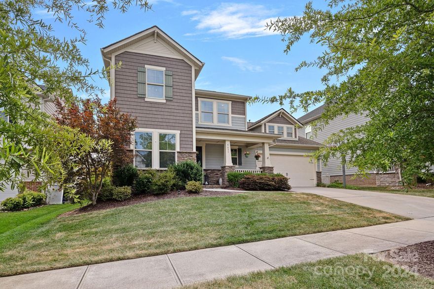 Prepare to be captivated by this Vermillion gem! Step inside this designer spread with an open-concept layout. The main floor includes a guest suite with a full bathroom, perfect for guests or as a dedicated office space. Continue through to the white kitchen of your dreams, featuring a newly upgraded pantry. The kitchen is seamlessly integrated into the living room with custom built-ins & a dining area. The primary suite, just off the living room, offers the luxury of a high-end hotel experience, sizable bedroom and bathroom with dual custom closets.The second floor continues with three additional bedrooms, two full bathrooms, & a versatile loft space. All bedrooms feature custom closets for optimal organization. Outside, an entertainer's paradise awaits with private lush landscaping, fire pit, and large covered porch. Vermillion amenities include two pools, multiple green spaces, playgrounds, walking trails, & its very own restaurant (Harvey’s).
