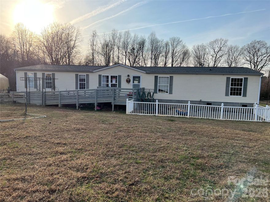 Set on 1.67 acres of usable land, this property presents a rare opportunity to create value and build sweat equity in a peaceful country setting. Located just outside Harmony, the property provides the space and privacy many buyers are searching for while still offering reasonable access to Statesville and I-77 for commuting, shopping, and daily conveniences.

The mobile home is livable but will require improvements, making it a strong opportunity for investors, renovators, or buyers comfortable taking on a project. With the right vision and updates, there is clear potential to build equity while enjoying the benefits of a rural setting.

What truly sets this property apart is the 1.67 acres of open land, providing room for outdoor living, gardening, projects, or simply enjoying the quiet surroundings. Properties with this amount of land and potential are becoming increasingly difficult to find.

For buyers willing to bring some work and creativity, this property offers the chance to transform a solid piece of land into something truly special.