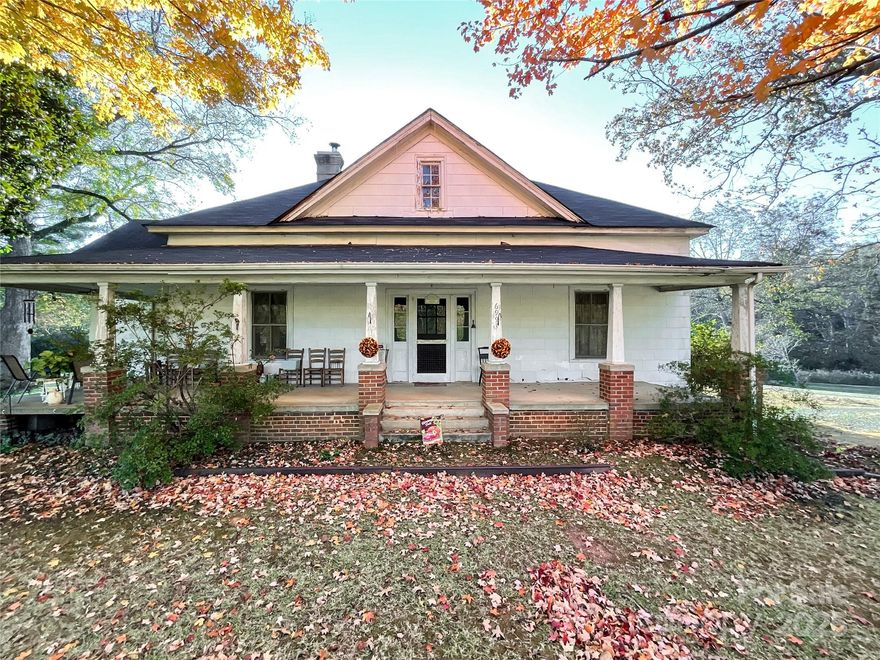 Charming 1916 home on 3.96 acres, perfectly located on Highway 521 in a thriving, fast-growing area. This rare property offers endless possibilities for a private estate, custom residence, or future residential development. Enjoy privacy and space while staying close to top schools, shopping, dining, and all conveniences. Combining historic character with modern potential, this is a truly unique opportunity to create your dream home in one of the region’s most desirable locations.  Many unique rooms with lots of space!
Currently zoned Low Density Residential.  As of 9/26/25 Lancaster County UDO future land use map has it labeled as Growth are meaning Commercial Zoning would be allowed w/Design and Environmental Guidelines.  County Water is available on 521 contact Lancaster County Water and Sewer as tap fee is required.  The Lancaster County 9 month moratorium states it can be sub-divided up to 3 parcels making it a total of 4 parcels.  Located in the Southern Panhandle Small Area Plan https://www.lancastercountysc.gov/251/Southern-Panhandle-Small-Area-Plan
Highway 521 is proposed to be widened.  Mobile home on property is not habitable.  Septic and repair fields are on adjoining property owned by family members, no written agreement.  There is a buried fuel tank on the property, seller makes no representation as to its condition.  400 sq ft. Basketball patio.  County was not able to find septic permit on file.