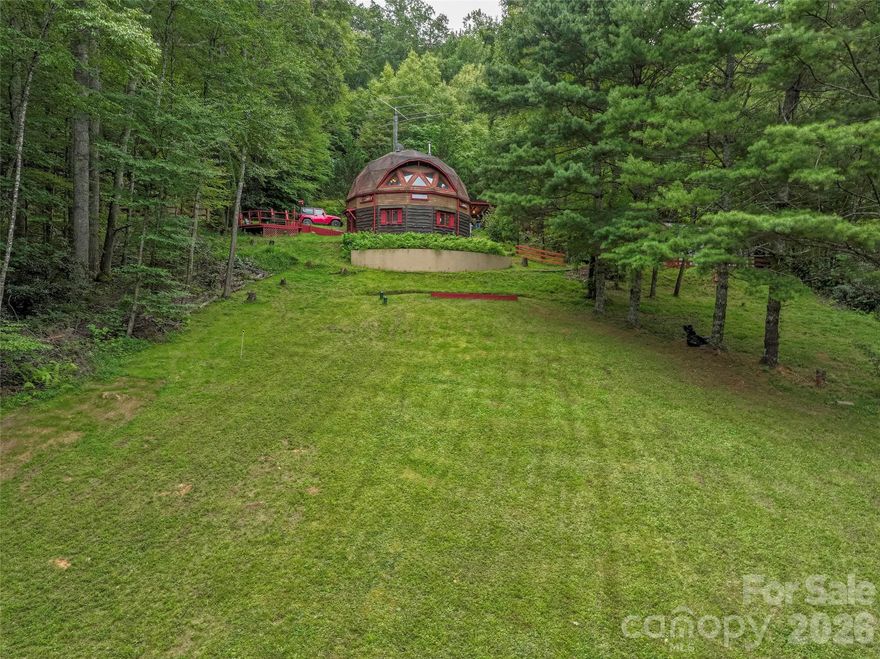 Price Improvement to $299,999 — Now Better Than Ever!
With a brand-new garage door and a fresh clean-up, this one-of-a-kind property is ready to impress. And the year-round views? Simply breathtaking—no photo can truly capture them.

Step into something truly extraordinary with this geodesic dome home set on three peaceful acres of natural beauty. Designed for strength, efficiency, and flexibility, this distinctive 2-bedroom, 1-bath retreat features a bright, open living area enhanced by its iconic triangular architecture, delivering both visual interest and energy efficiency.

Inside, hardwood floors and comfortable living spaces create a warm, inviting atmosphere—perfectly livable now and ready for your personal vision. Outdoors, the property truly shines with a 30×25 garage and a 25×20 Quonset Hut wood workshop, ideal for furniture building, hobbies, or creative projects. A circular driveway and spacious yard add convenience and curb appeal.

Located just 10 minutes from town, this property offers the rare combination of privacy, character, and accessibility. Whether you’re looking for a full-time residence, a creative escape, or a sustainable homestead, this exceptional home delivers charm, functionality, and a setting that feels genuinely special.
