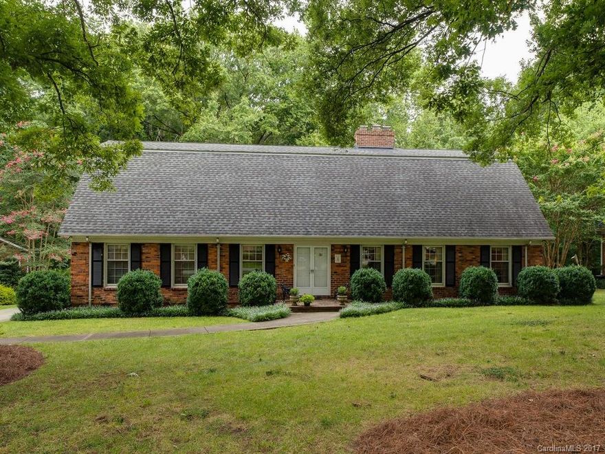 Lovely Brick Ranch Home Located on Private Wooded .89 Acre Lot with Mature Trees Conveniently Located to SouthPark with Excellent Shopping and Restaurants!  Rear Entry 2 Car Carport with Patio. Roof (2007), HVAC (2015), Bathrooms with Raised Vanities and Granite Countertops, Beautiful Hardwood Floors, Neutral Colors and 2 Fireplaces ("As-Is" With No Known Issues). Kitchen with Rich Wood Cabinetry. Pride of Ownership – Shows Beautifully!