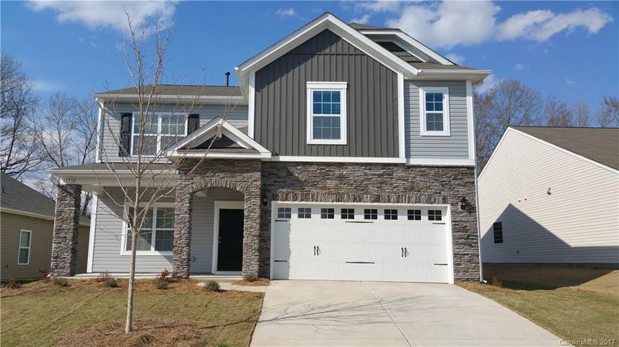 Brand new home with open floor plan. Guest Suite on the first floor with Master and 3 other bedrooms on 2nd. Large kitchen with all new stainless steel appliances and a washer and dryer on the 2nd. Hardwood floors and gas fireplace on first floor with carpeted floors on 2nd.