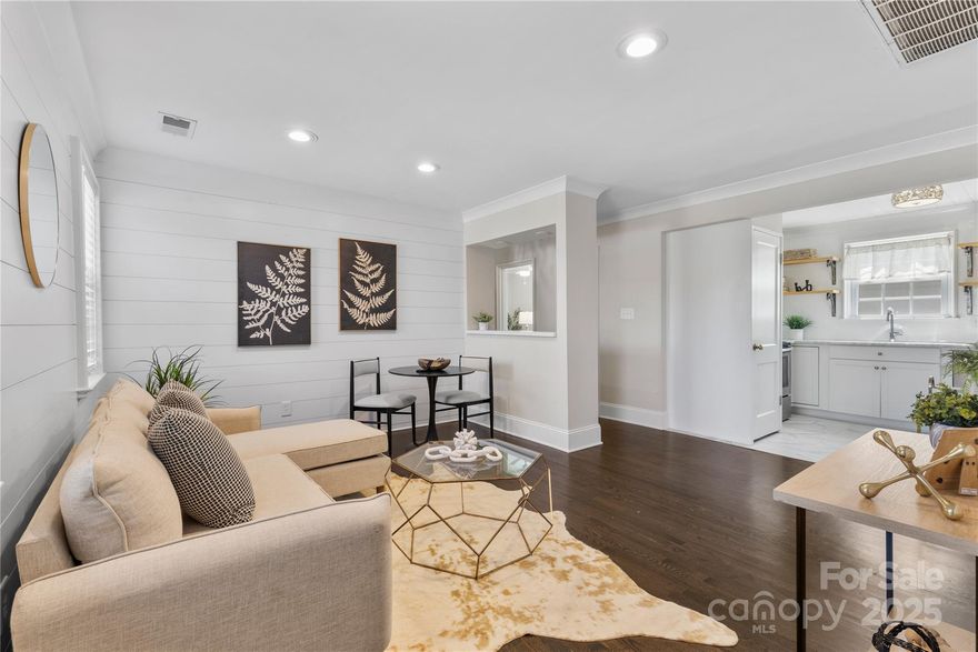 Prime Myers Park Location! This beautifully updated 2-bedroom, 1-bathroom condo offers the best of city living with unbeatable walkability. Every detail has been thoughtfully crafted, from the custom shiplap wall to the elegant crown molding that extends throughout the home. Just steps from the Greenway, Park Road Shopping Center, and Selwyn Corners, and minutes to both SouthPark and Uptown. Inside, enjoy a bright and open floor plan with abundant natural light. The modern kitchen features stainless steel appliances, quartz countertops, and a convenient stackable washer and dryer. The updated bathroom includes a stylish vanity and sleek tile shower. Both bedrooms are comfortably sized and well-appointed. This is also NOT in the flood zone of Selwyn Village.