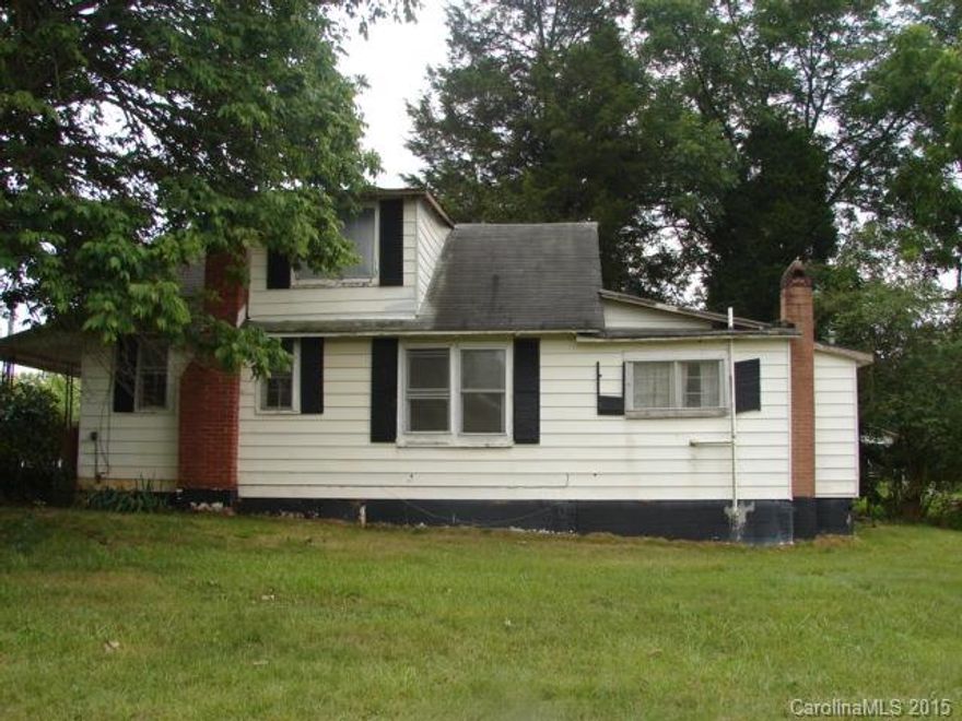 Being sold "AS IS". Needs TLC, wood floors under carpet, appliances remain. Not a foreclosure!
