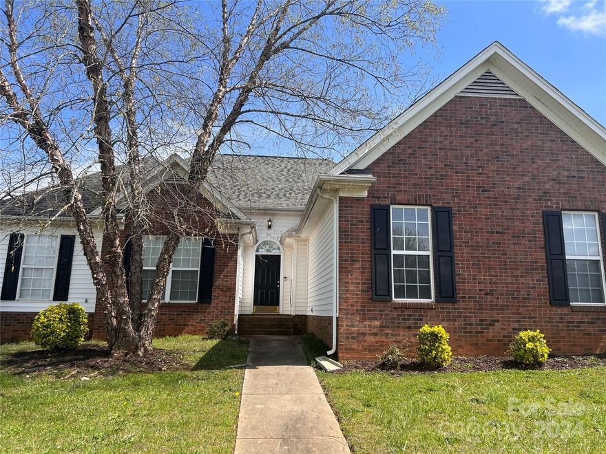 An amazing, huge corner lot is now available in Melrose Place!! .44 acres on a beautiful elevated lot. Walking in you are immediately greeted with a gorgeous Great Room featuring a fireplace and vaulted ceilings. Open concept living gives you a dining room in the front of the house and an updated kitchen big enough to have a separate breakfast area. Kitchen is white with granite counters, tile backsplash, and tile floors. Main level living offers the primary suite on the main floor. This en suite has its own sitting area, vaulted ceilings, separate tub and shower, dual vanities, and tile flooring. The view of the level, private backyard is lovely and peaceful. There are custom design features throughout this home making it truly special. It's move in ready and priced to sell!