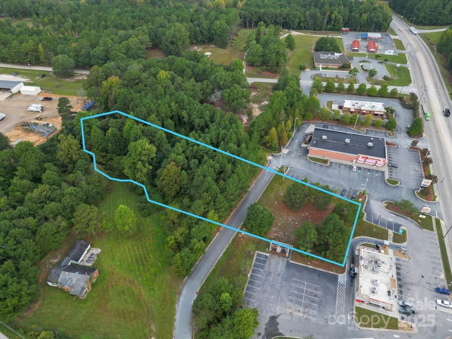 Prime Commercial land for sale! Unlock the potential of this 1.33 acre parcel of prime commercial land, ideal for a wide range of business uses. Situated just off Van Lingle Mungo Blvd with high visibility and excellent traffic counts, this site offers convenient access to major highways and businesses, ensuring steady foot traffic and strong customer base potential. AADT Traffic Counts average over 12,000 per SCDOT